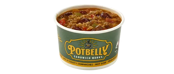 A robust Potbelly Menu item, the Potbelly Chili, featuring a hearty beef chili with kidney beans, bell peppers, and onions, served in a branded green cup against a black background, priced at $5.49 with 247 calories.